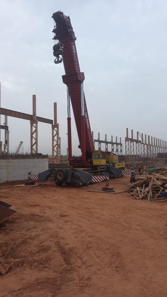 LIFTING & TRANSPORTATION OF CONCRETE BEAMS FOR STEEL FACTORY CONSTRUCTION